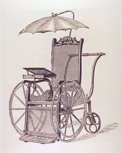 Wheelchair_with_writing_desk_and_umbrella