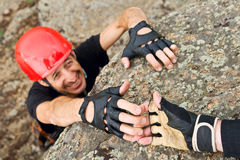 climber-lending-helping-hand-22864293